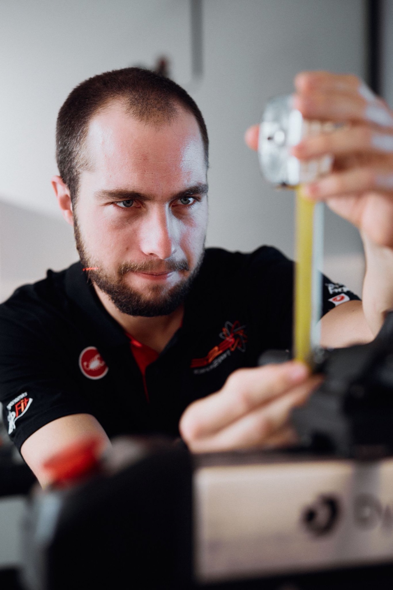 Felix Imbery taking precise measurements on the Giant Dynamic Cycling Fit system